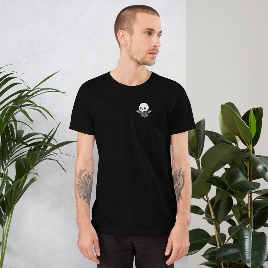 Model wearing a black Initial T tee with a small chibi skull-ghost print on the left chest.